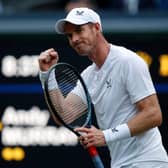 Britain’s Andy Murray celebrates winning a game during his men’s singles tennis match against Australia’s James Duckworth on the first day of the 2022 Wimbledon Championships. (Photo by Adrian DENNIS / AFP)