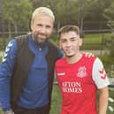 Billy Gilmour poses for a photo with first-team manager Ryan Stevenson (Credit: @GlenaftonAJFC)