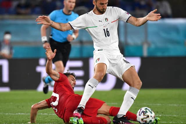  Bryan Cristante of Italy is challenged by Ridvan Yilmaz of Turkey during the UEFA Euro 2020 Championship Group A match between Turkey and Italy (GETTY)