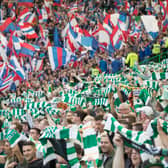 Celtic and Rangers supporters get behind their sides (Photo by Steve  Welsh/Getty Images)