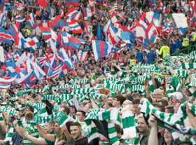 Celtic and Rangers supporters get behind their sides (Photo by Steve  Welsh/Getty Images)