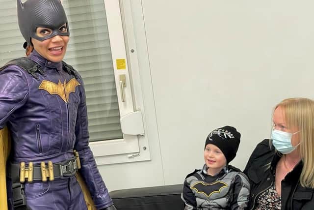 Finlay Mckechnie with mum Suzanne Steele, and Batgirl actress Leslie Grace. 