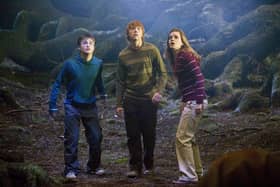  This undated photo supplied by Warner Bros. shows Daniel Radcliffe, left, Rupert Grint, center, and Emma Watson in a scene from "Harry Potter and the Order of the Phoenix." The world premiere of the fifth movie based on the best-selling books about the boy wizard, will be held June 28, 2007 in Tokyo.(AP Photo/Warner Bros.,Murray Close)