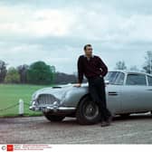 Sean Connery Goldfinger - 1964 Director: Guy Hamilton Danjaq/EON/UA BRITAIN Scene Still James Bond Action/Adventure. Photo by Photo by Danjaq/Eon/Ua/Kobal/Shutterstock