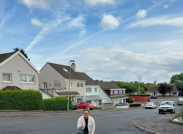 <p>Cllr Kerr on one of the repaired roads.</p>
