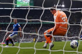 Jon McLaughlin of Rangers is beat by the shot of Liel Abada for Celtic's third goal 