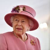 Queen Elizabeth II speaks with staff during a visit to the Defence Science and Technology Laboratory (Dstl) at Porton Down science park on October 15, 2020 near Salisbury, England. (Photo: Ben Stansall - WPA Pool/Getty Images)