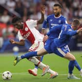  Mohammed Kudus of Ajax is challenged by Connor Goldson and John Lundstram of Rangers during the UEFA Champions League group A match between AFC Ajax and Rangers