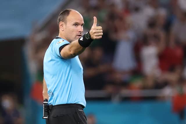 Spanish referee Antonio Miguel Mateu Lahoz gestures during the UEFA EURO 2020 Group F football match between Portugal and France