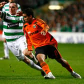 Scott Brown of Celtic tackles Jadson of Shakhtar Donetsk during the UEFA Champions League match between Celtic and  Shakhtar Donetsk at Celtic Park on November 28, 2007