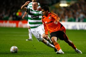 Scott Brown of Celtic tackles Jadson of Shakhtar Donetsk during the UEFA Champions League match between Celtic and  Shakhtar Donetsk at Celtic Park on November 28, 2007