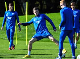 Rangers' players attend a training session on the eve of the UEFA Champions League group A football match between Scotland's Rangers and Italy's Napoli at the Rangers Training Centre in Milngavie 