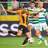 Taras Stepanenko of FC Shakhtar Donetsk fights for the ball with Matt O’Riley of Celtic 