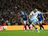 Matteo Politano of SSC Napoli scores their side's first goal from the penalty spot 