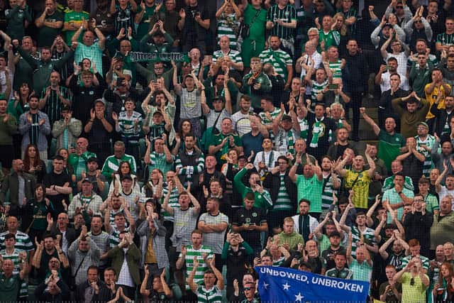Fans of Celtic display a flag against the crown during the UEFA Champions League group F match between Shakhtar Donetsk and Celtic
