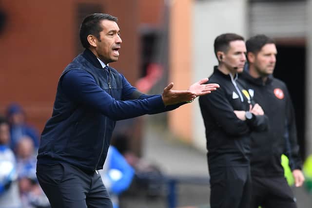 Giovanni van Bronckhorst, manager of Rangers applauds his team from the sideline during the Cinch Scottish Premiership match between Rangers and Dundee United