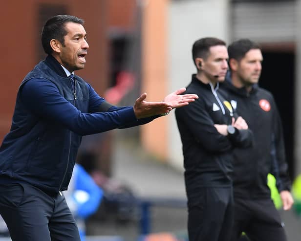 Giovanni van Bronckhorst, manager of Rangers applauds his team from the sideline during the Cinch Scottish Premiership match between Rangers and Dundee United