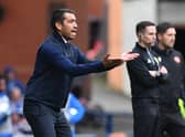 Giovanni van Bronckhorst, manager of Rangers applauds his team from the sideline during the Cinch Scottish Premiership match between Rangers and Dundee United