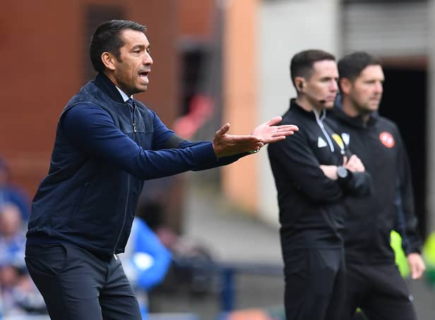 <p>Giovanni van Bronckhorst, manager of Rangers applauds his team from the sideline during the Cinch Scottish Premiership match between Rangers and Dundee United</p>