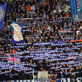 Rangers’ fans cheer during the UEFA Champions League Group A football match against Napoli at Ibrox stadium