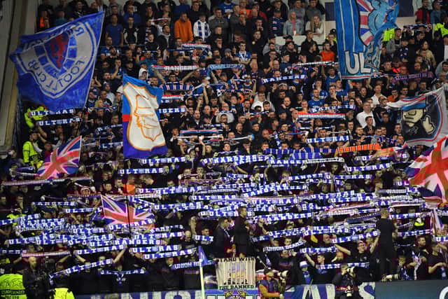Rangers’ fans cheer during the UEFA Champions League Group A football match against Napoli at Ibrox stadium