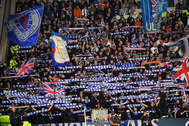 Rangers’ fans cheer during the UEFA Champions League Group A football match against Napoli at Ibrox stadium
