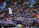 Rangers’ fans cheer during the UEFA Champions League Group A football match against Napoli at Ibrox stadium