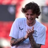 Midfielder Alex Lowry laughs as he takes part in a training session, on the eve of the Europa League final