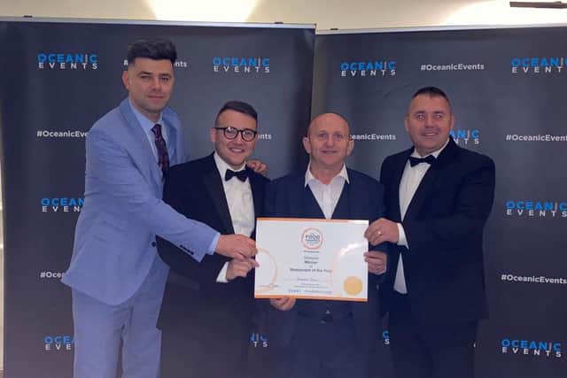 Some of the family and staff at Ristorante Pieno after winning their award at The Food Awards at the Marriott.