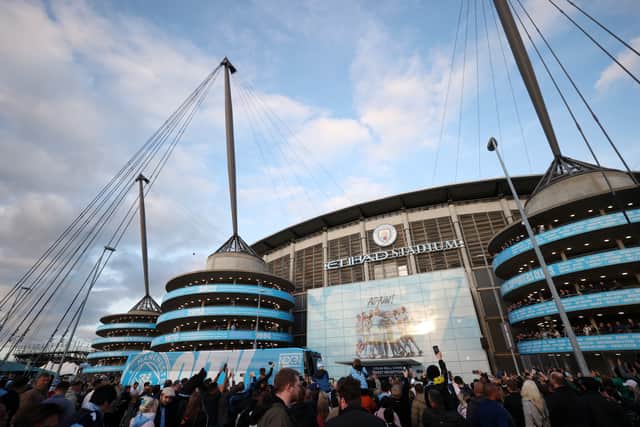 A general view outside the stadium as fans arrive prior to the UEFA Champions League group G match between Manchester City and Borussia Dortmund at Etihad Stadium 