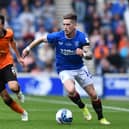 Ryan Kent takes on Liam Smith of Dundee United during the Cinch Scottish Premiership match between Ranger and Dundee United 
