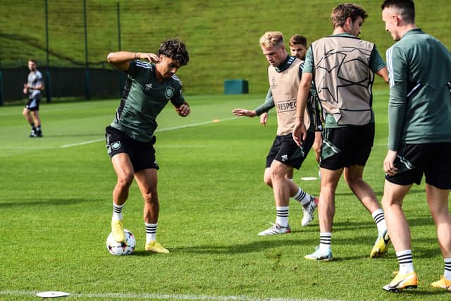Celtic’s Portuguese forward Jota (L) takes part in a training session at the Celtic Training Centre in Lennoxtown
