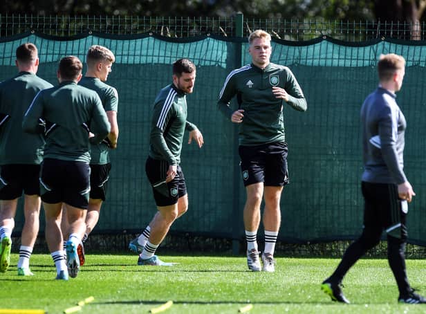 <p>Celtic's team players take part in training session at the Celtic Training Centre in Lennoxtown</p>