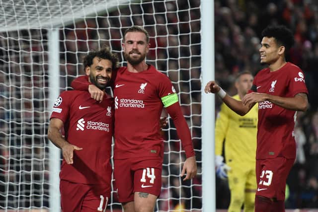 Mohamed Salah celebrates after scoring the second goal during the UEFA Champions League group A match