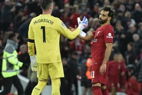 Mohamed Salah of Liverpool with Allan McGregor of Rangers at the end UEFA Champions League group A match