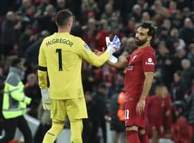 Mohamed Salah of Liverpool with Allan McGregor of Rangers at the end UEFA Champions League group A match