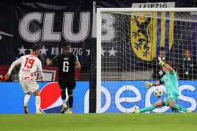 Andre Silva of RB Leipzig scores their team's third goal during the UEFA Champions League group F match between RB Leipzig and Celtic
