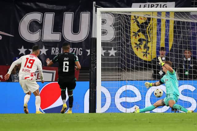 Andre Silva of RB Leipzig scores their team's third goal during the UEFA Champions League group F match between RB Leipzig and Celtic