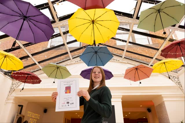 Individual winner Lily Blake (aged 11) from Hillhead Primary School with her poem, ‘Don’t be in Such a Rush to Grow Up’. 