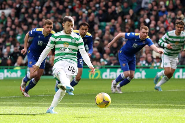 Josip Juranovic of Celtic scores his side's fourth goal from a penalty