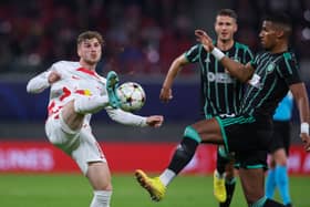 Leipzig's German forward Timo Werner (L) and Celtic's German defender Moritz Jenz vie for the ball during the UEFA Champions League Group F football match RB Leipzig v Celtic FC in Leipzig, eastern Germany