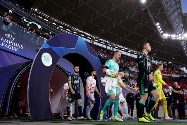 Players of Celtic and Leipzig enter the pitch before the UEFA Champions League Group F football match RB Leipzig v Celtic FC in Leipzig, eastern Germany