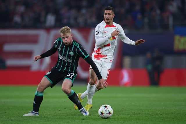 Celtic’s Scottish defender Stephen Welsh (L) and Leipzig’s Portuguese forward Andre Silva vie for the ball 