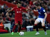 Mohamed Salah is challenged by Leon King during the UEFA Champions League group A match between Liverpool and Rangers (Photo by Clive Brunskill/Getty Images)