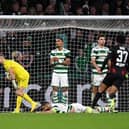 Joe Hart, Cameron Carter-Vickers and Moritz Jenz of Celtic look dejected after Emil Forsberg (not pictured) of FC Leipzig scores their team's second goal 