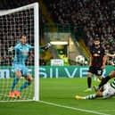 Celtic’s Greek striker Giorgos Giakoumakis (C) fails to score during the UEFA Champions League Group F match