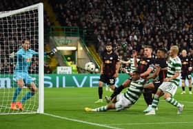 Celtic’s Greek striker Giorgos Giakoumakis (C) fails to score during the UEFA Champions League Group F match