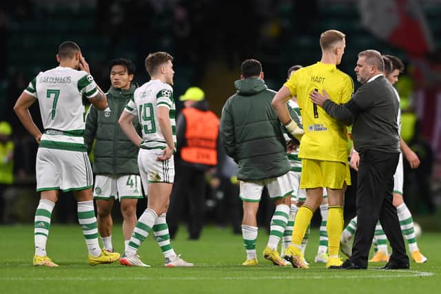 Ange Postecoglou, Manager of Celtic interacts with Joe Hart following their sides defeat