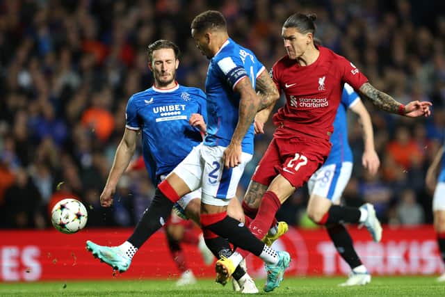  Darwin Nunez of Liverpool battles for possession with James Tavernier and Ben Davies of Rangers 