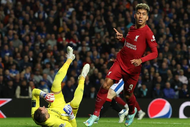 Roberto Firmino of Liverpool celebrates after scoring their team's second goal